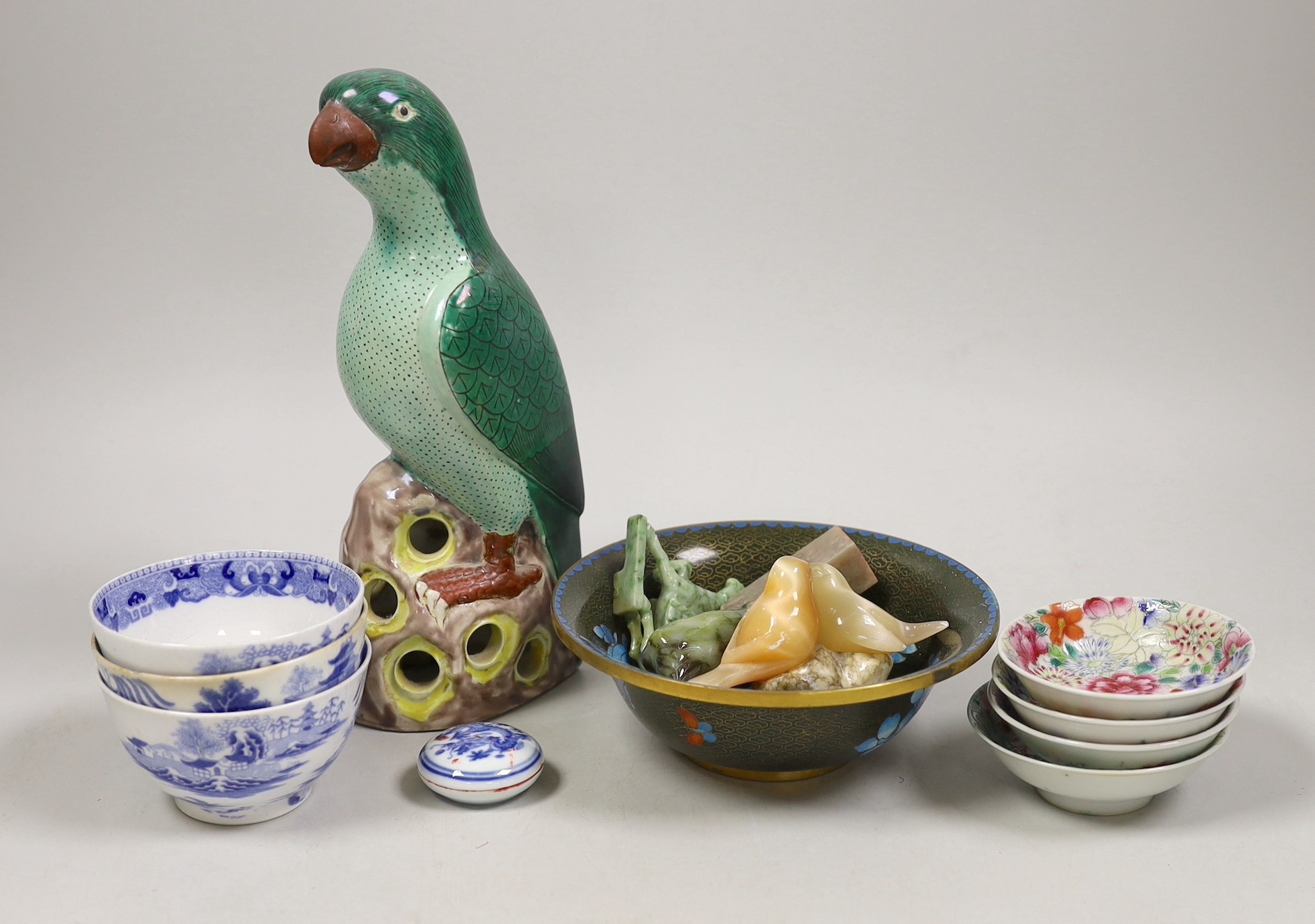 A group of Chinese hardstone carvings, a cloisonné enamel bowl, famille rose dishes and four blue and white bowls and model bird. Tallest 23cm